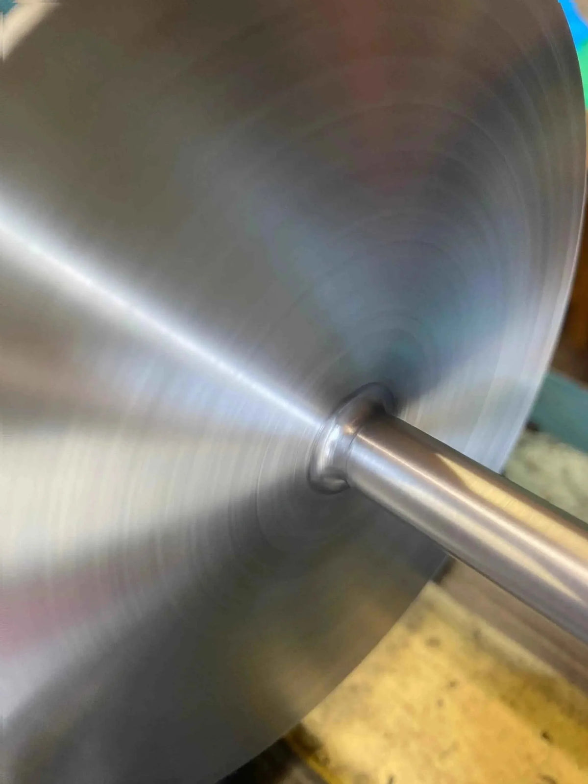 Close-up of a durable stainless steel falconry perch, showcasing its smooth finish and robust construction.